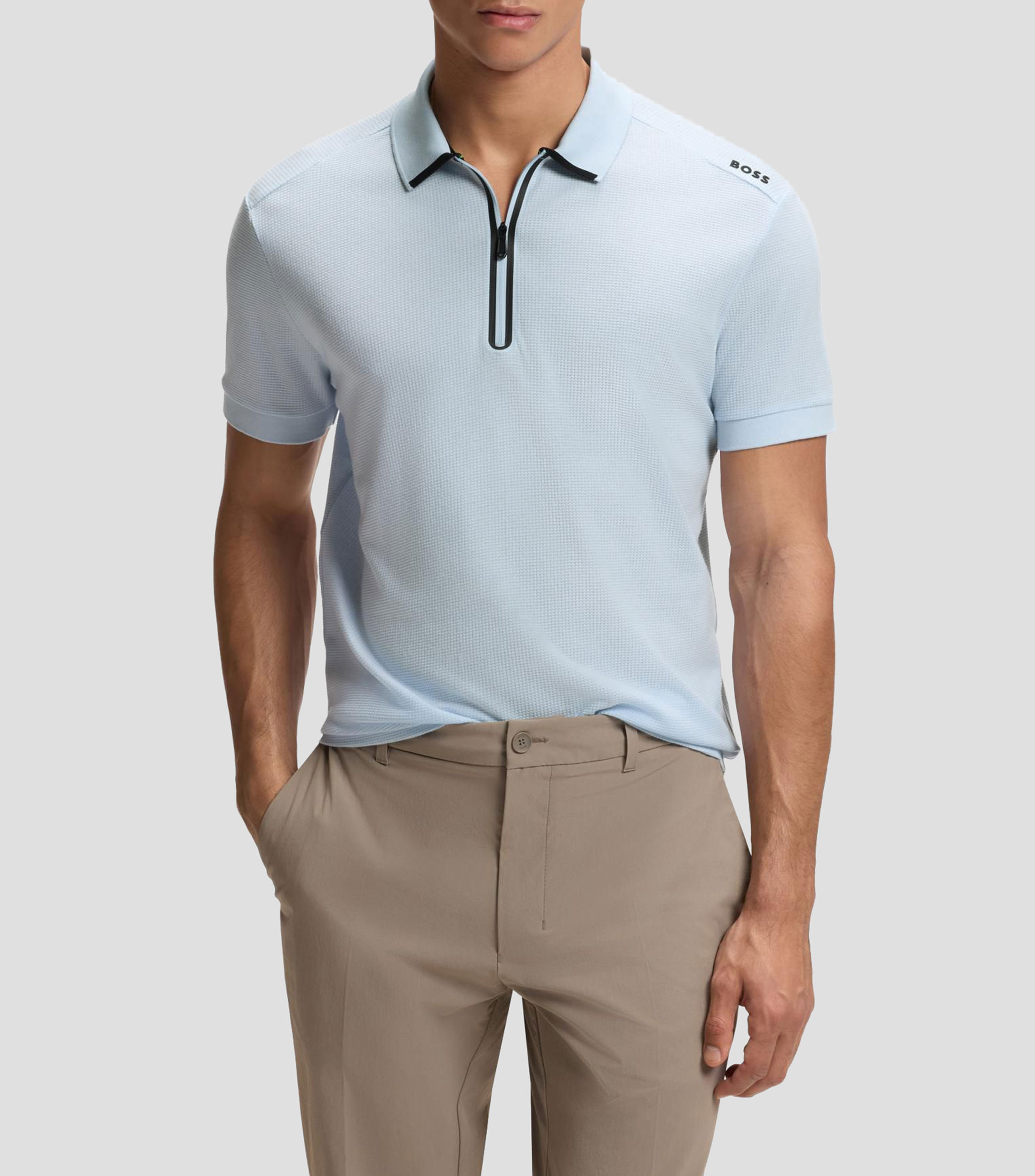 Polo en jacquard de rejilla con cuello con cremallera Hombre